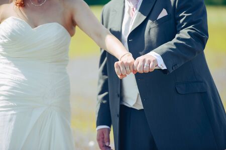 Beautiful two golden wedding rings. Made of highest quality materialの写真素材