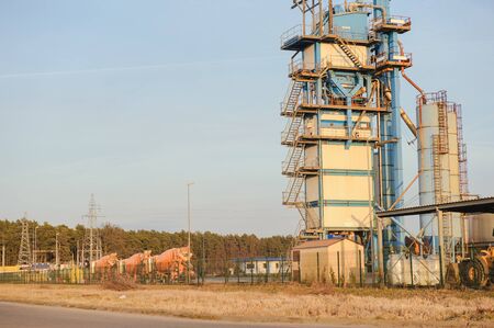 Modern industrial exterior building over blue sky
