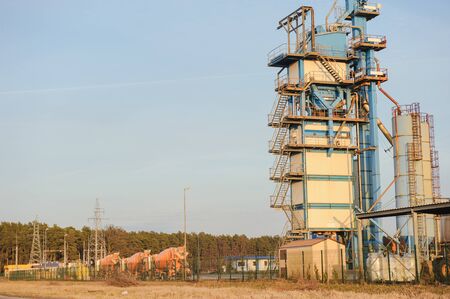 Modern industrial exterior building over blue skyの写真素材
