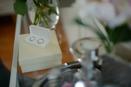 Beautifully decorated wedding table and other details at wedding hall. Wedding day