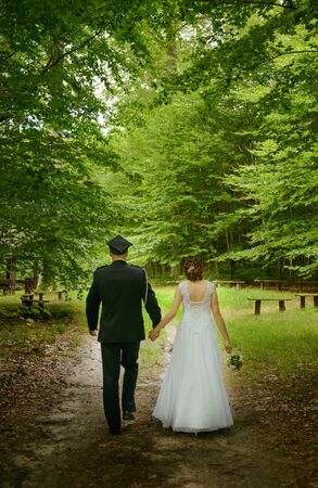 Bride and groom at a photo session in the nature.の写真素材