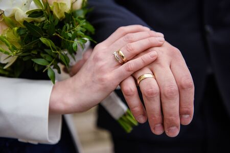 Beautiful two golden wedding rings. Made of highest quality materialの写真素材