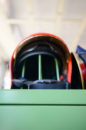 Red firefighter helmet close up at firestationの写真素材