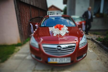 Luxury wedding car decorated with beautiful flowers. Brides and grooms wedding dayのeditorial素材
