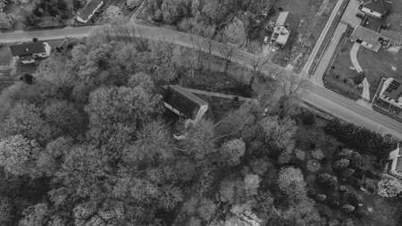 Aerial view from drone to romantic citiscape in Poland, Central Europe. HDR warm filtered photography. Church in the middleの写真素材