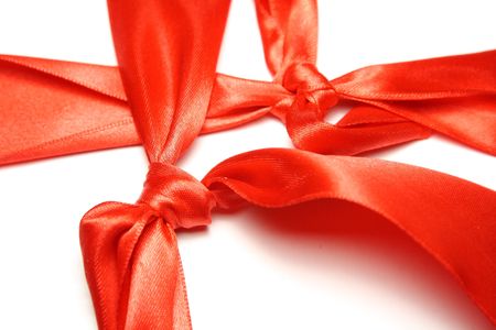 against a backdrop of red tape for a giftの写真素材