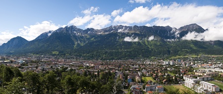 Panoramic picture of the city of Innsbruck, Austria and the Alps behind itの写真素材