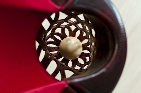A white cue ball pocketed in a pool table's cornerの写真素材