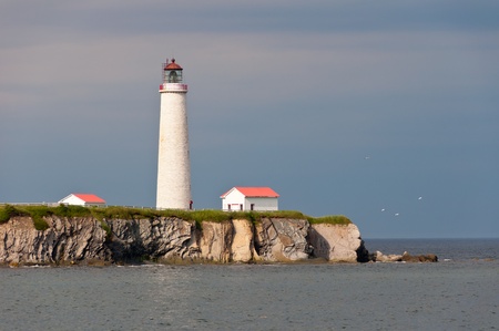 Tall lighthouse from the Forillon national park in Gaspesieの写真素材