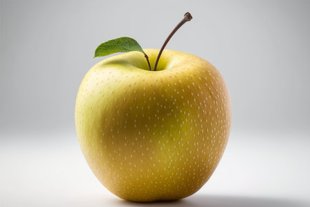 Ripe yellow apple with green leaf on white background. 3d illustrationの素材