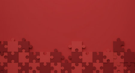 This image features jigsaw puzzle pieces in varying shades of red laid out on a similarly colored red surface The pieces are arranged in a pattern with some connected and others scattered creating a visually intriguing design The monochrome palette emphasizes the shapes and textures of the puzzle pieces highlighting the concept of connection problemsolving and unity This image could be used to represent collaboration teamwork or the need to find solutions to complex problemsの素材