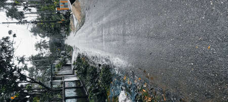 A panoramic shot of rain falling on the roadの写真素材