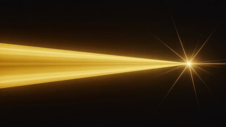 Abstract light lens flare. Sun flash with rays and spotlight on black background.の素材