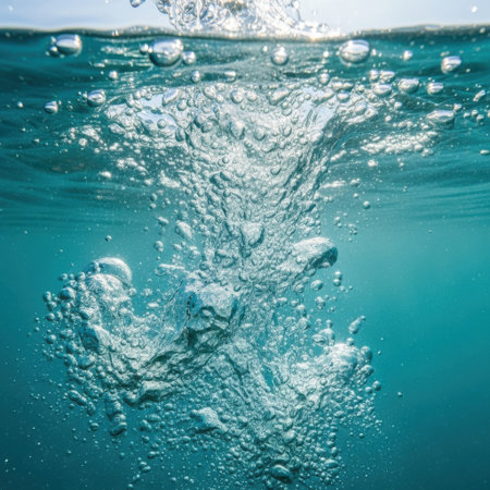 Close-up of water splashes and bubbles in the ocean.の素材
