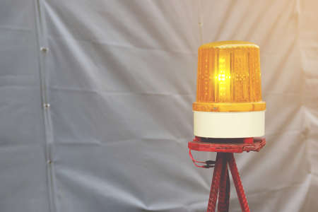 Yellow Siren Light at a Construction Siteの写真素材