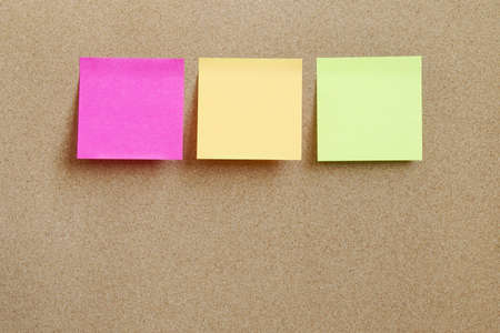Compressed Cork Board with Colorful Blank Note Papers Sticked on for add Text Message