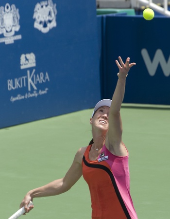 KUALA LUMPUR - MARCH 4: Jelena Jankovic(SRB) return ball during quarter final match against Petra Martic(CRO) in Kuala Lumpur, Malaysia on Sunday, March 4, 2012. のeditorial素材