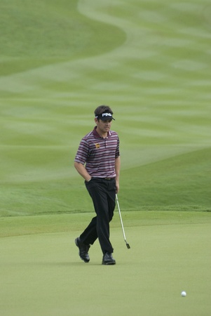 KUALA LUMPUR - APRIL 12: Louis Oosthuizen of South Africa in the 16th green during 1st round of Maybank Malaysian Open 2012 at Kuala Lumpur Golf & Country Club on Thursday, April 12, 2012のeditorial素材