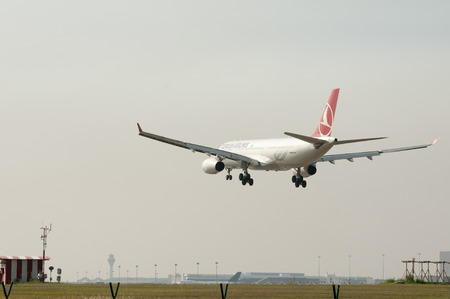 SEPANG, MALAYSIA - JULY 20: Airbus A330 343 with registered number TC-JNR owned by Turkish Airlines ready to landing at Kuala Lumpur International Airport, Sepang, Malaysia on July 20, 2014.のeditorial素材
