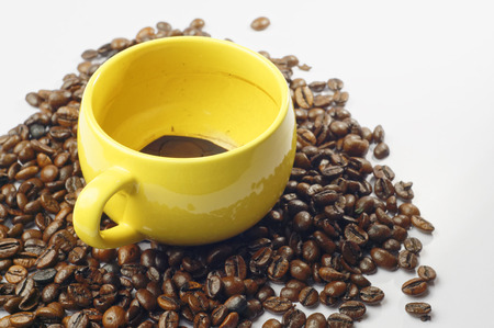 Close up of empty cop of Coffee with coffee bean