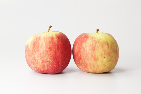 Red Apple isolated on white backgroundの写真素材