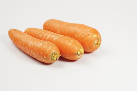 Close up Fresh of Carrot isolated on white backgroundの写真素材