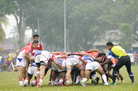 SERDANG, SELANGOR - SEPTEMBER 27: Sabah rugby player scruml during 33rd Rugby Agong cup quarter finals against ATM with score Sabah 32 - ATM 15 at Serdang, Selangor, Malaysia on September 27, 2015のeditorial素材