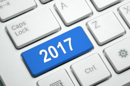2017  written on Blue button White Keyboardの写真素材