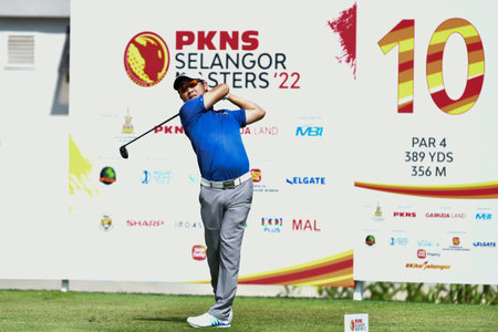 PETALING JAYA, NOV 24 : Edven Ying of Malaysia, teeing of at hole 18th, during Round 2 of PKNS Selangor Masters '22 at Kelab Golf Seri Selangor. Petaling Jaya, Malaysia on November 24, 2022.のeditorial素材