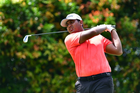 PETALING JAYA, NOV 24 : Edven Ying of Malaysia, teeing of at hole 18th, during Round 2 of PKNS Selangor Masters '22 at Kelab Golf Seri Selangor. Petaling Jaya, Malaysia on November 24, 2022.のeditorial素材