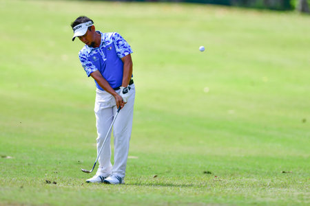 PETALING JAYA, NOV 24 : Kemarol Baharin of Malaysia, teeing of at hole 13th, during Round 2 of PKNS Selangor Masters '22 at Kelab Golf Seri Selangor. Petaling Jaya, Malaysia on November 24, 2022.のeditorial素材