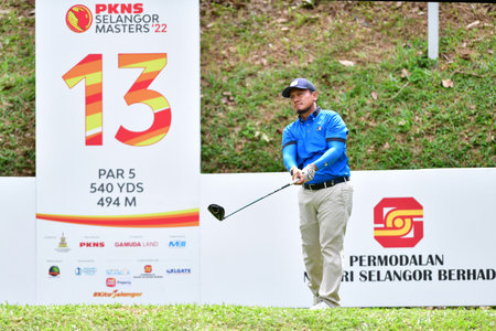 PETALING JAYA, NOV 24 : Edven Ying of Malaysia, teeing of at hole 18th, during Round 2 of PKNS Selangor Masters '22 at Kelab Golf Seri Selangor. Petaling Jaya, Malaysia on November 24, 2022.のeditorial素材