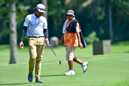 PETALING JAYA, NOV 24 : Kemarol Baharin of Malaysia, teeing of at hole 13th, during Round 2 of PKNS Selangor Masters '22 at Kelab Golf Seri Selangor. Petaling Jaya, Malaysia on November 24, 2022.のeditorial素材