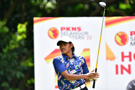 PETALING JAYA, NOV 24 : Kemarol Baharin of Malaysia, teeing of at hole 13th, during Round 2 of PKNS Selangor Masters '22 at Kelab Golf Seri Selangor. Petaling Jaya, Malaysia on November 24, 2022.のeditorial素材