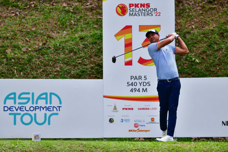 PETALING JAYA, NOV 24 : Kemarol Baharin of Malaysia, teeing of at hole 13th, during Round 2 of PKNS Selangor Masters '22 at Kelab Golf Seri Selangor. Petaling Jaya, Malaysia on November 24, 2022.のeditorial素材