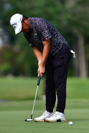 PETALING JAYA, NOV 25 : Shahriffuddin Ariffin(R) of Malaysia, pictured during Round 3 of PKNS Selangor Masters '22 at Kelab Golf Seri Selangor. Petaling Jaya, Malaysia on November 25, 2022.のeditorial素材