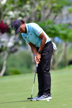 PETALING JAYA, NOV 25 : Shahriffuddin Ariffin(R) of Malaysia, pictured during Round 3 of PKNS Selangor Masters '22 at Kelab Golf Seri Selangor. Petaling Jaya, Malaysia on November 25, 2022.のeditorial素材