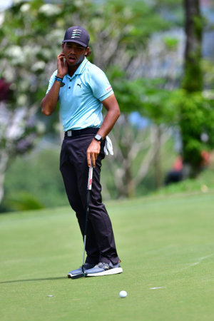 PETALING JAYA, NOV 25 : Shahriffuddin Ariffin(R) of Malaysia, pictured during Round 3 of PKNS Selangor Masters '22 at Kelab Golf Seri Selangor. Petaling Jaya, Malaysia on November 25, 2022.のeditorial素材