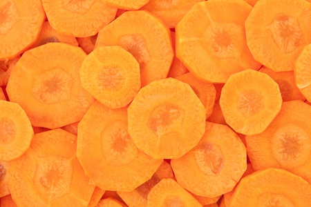 Healthy natural food, background. Carrots slices. More background of fruits and vegetables in my portfolio.の写真素材