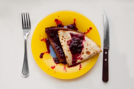 pancakes with milk with currant jam