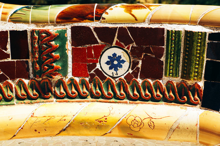 Mosaic on a bench in Park Guell. Gaudi. Barcelona. Spainの写真素材