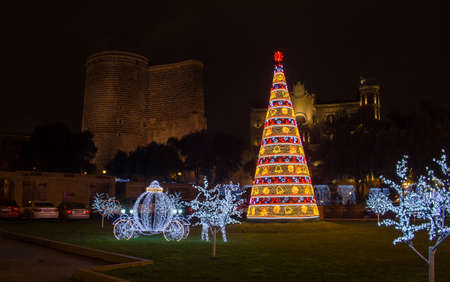 Azerbaijan. 2018 year. Beautiful New Year tree in Baku city. Near the Maiden's Tower. Winter.のeditorial素材