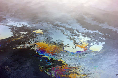 Beautiful oil slick on the water surfaceの写真素材