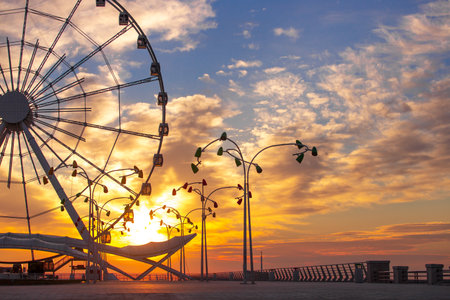Baku. Azerbaijan. 02.27.2021 Ferris wheel at sunrise.