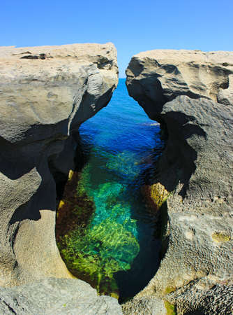 A beautiful grotto on the rocky shore.