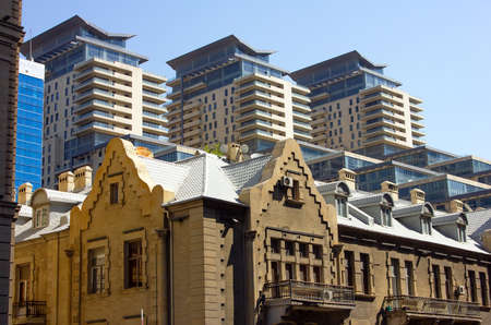 Baku. Azerbaijan. 05.23.2020 Old and new facades of city buildings.のeditorial素材