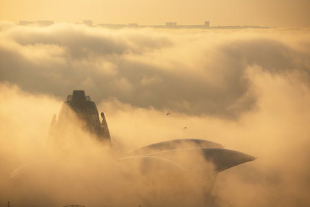 baku city. Azerbaijan. May 16, 2021 The Maritime Center on Primorsky Boulevard in the fog.のeditorial素材