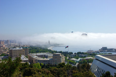baku city. Azerbaijan. 05.16.2021 year. Fog creeping through the city.のeditorial素材