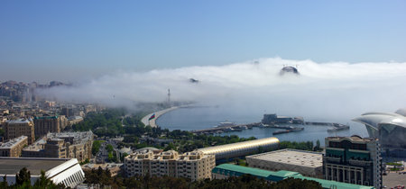 baku city. Azerbaijan. 05.16.2021 year. Fog creeping through the city.のeditorial素材