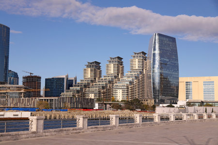 baku city. Azerbaijan. 11.28.2020. Modern buildings in the seaport area.のeditorial素材